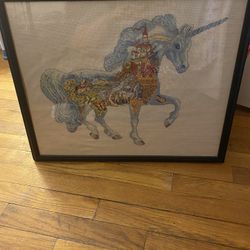 Finished Cross Stitch Of A Unicorn 