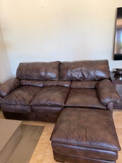 Brown Leather Couch and Ottoman