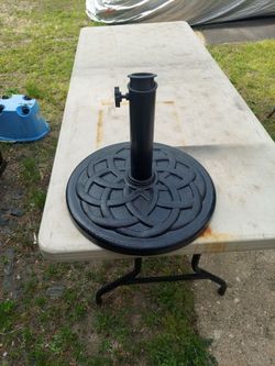 Black umbrella stand. Resin compound.25lbs