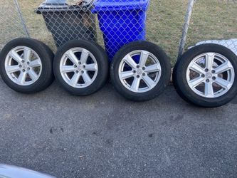 2 sett rims an a four wheeler shoot me offers  no low balling