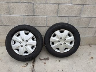 2 Toyota corola tires and wheels
