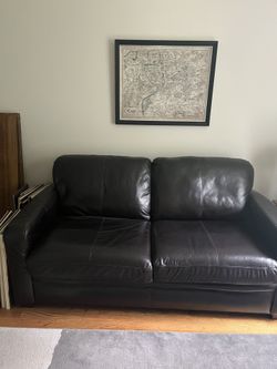Leather Sofa With Pull Out Mattress. 