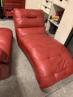 Red leather lounge chairs