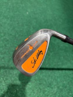Orange Whip 56 degree wedge golf training aid