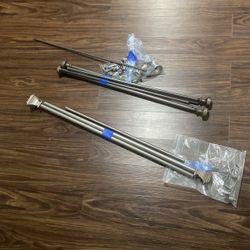 Two Curtain Rods With All The Parts 
