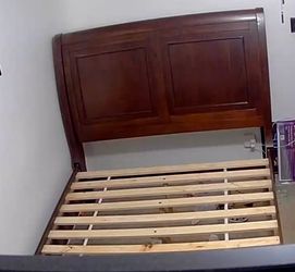 Queen sleigh style bed frame with drawers