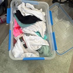 Bin Full Of Shirts And Sweaters 