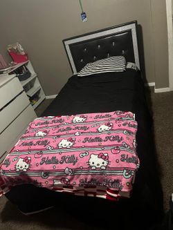 Twin bed with mattress