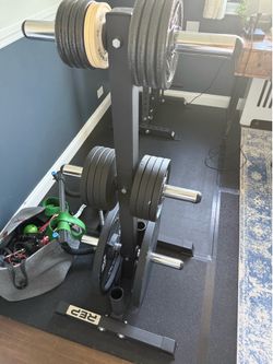 200lb Olympic metal weight plates and weight tree