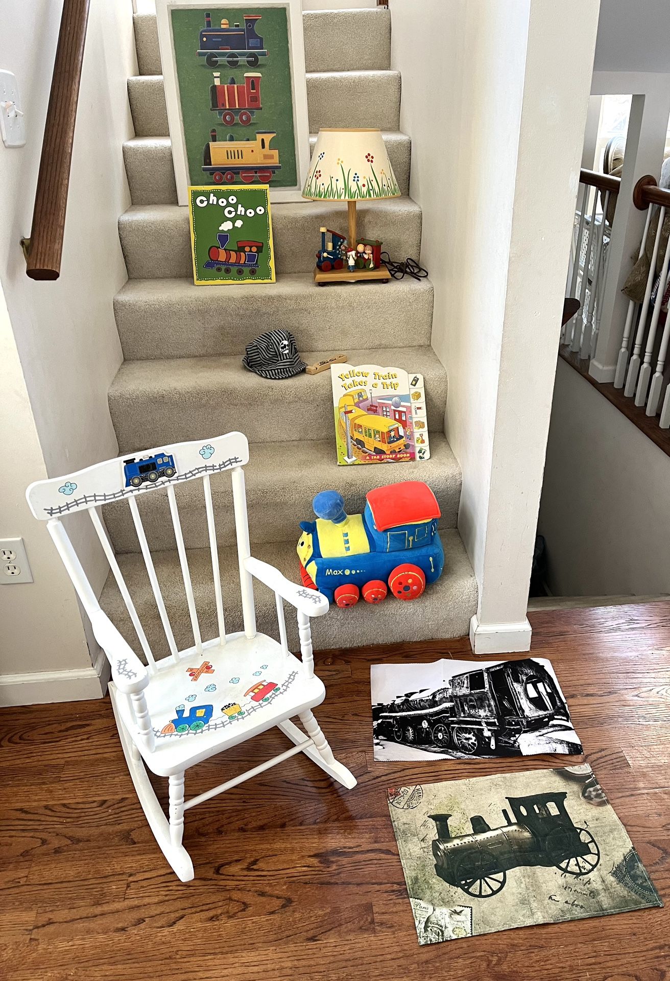 Train Theme Rocking Chair, Lamp With Music, Wall Art, Soft Pillow And Large Book ($65)