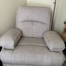 Beige reclinable and rocking chair 