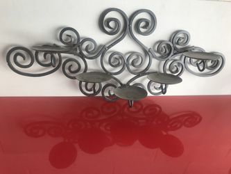 Iron candle holder