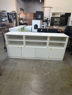 Big white tv stand with lights