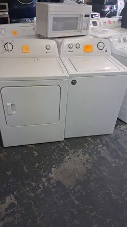 White Amana washer and electric dryer set