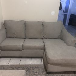 Ashley Furniture Gray Sectional With Pull Out Bed And Free Delivery