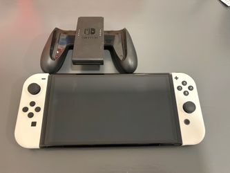 Nintendo switch OLED (console, grip controller and charger ONLY)