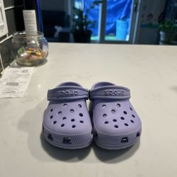 9c purple crocs 