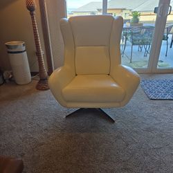 Beautiful While leather Swivel Chair