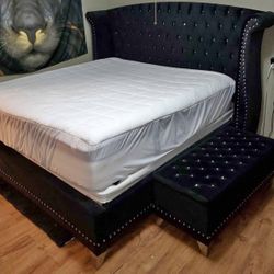 ALL BLACK UPHOLSTERED BED - silver trim