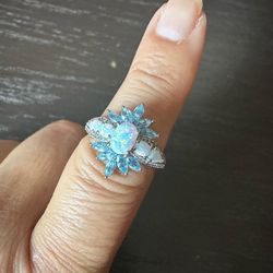 925 Sterling Silver, Opals and Genuine blue Topaz w/ Diamond accents . Tested in photos , size 7.25, marked PstarM 925, Beautiful