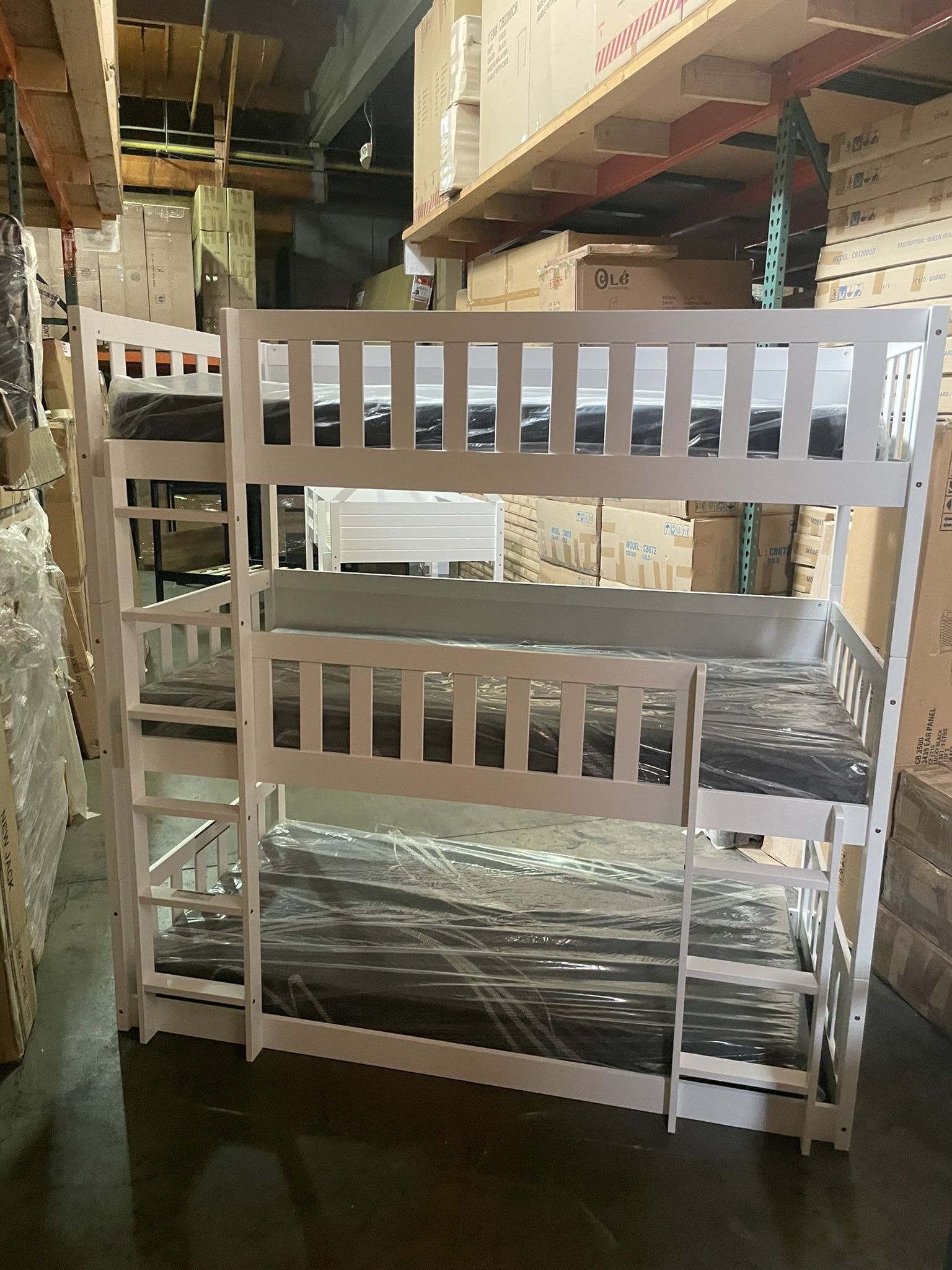 Triple bunk bed. Available in white & espresso. Assembly required. Assembly not included. Taxes included. Free delivery.  Bunk bed only-$450 Bunk bed 
