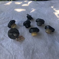 Assorted Gas Caps And Power Steering Cap