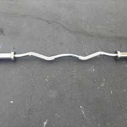 5ft Curvy Bar And 2 35lbs