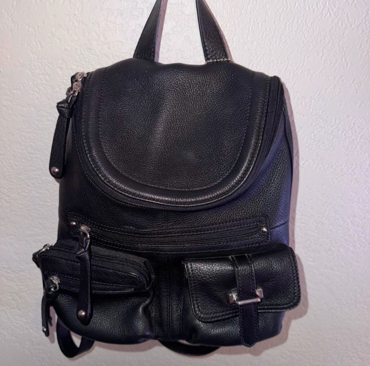 This Wilson Genuine Leather Black Mini Backpack Silver Cheetah Lining Travel