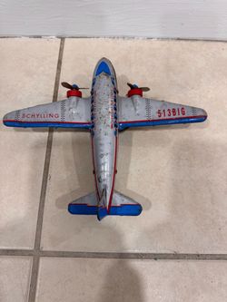 Attention collectors Vintage Schylling tin DC toy airplane, friction mtor turning propellers
