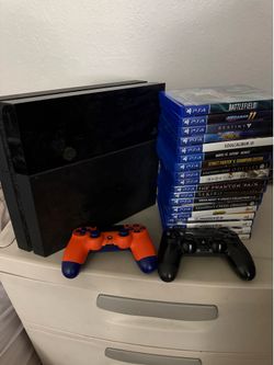 PS4. 2 Controllers. A Bunch of Games.