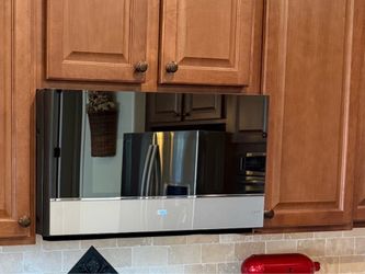 CAFÉ™ 2.1 Cu. Ft. Smart Over-the-Range Microwave Oven in Platinum Glass