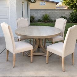 Round Wood Dining Table with 4 Upholstered Chairs