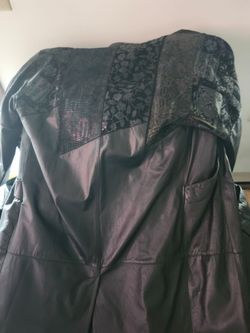 Berman's Black Leather midi coat.