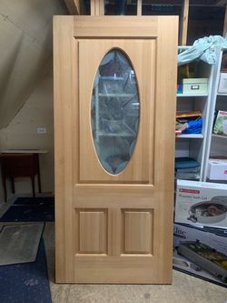 Wood Entry Door with Oval Glass Insert
