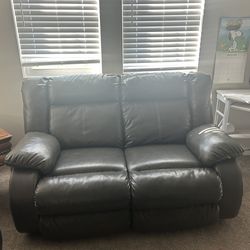 Two Leather Reclining Ashley Couches