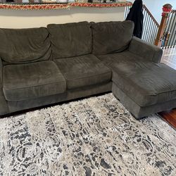 Dark gray sectional sofa or couch