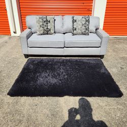 Grey Couch & Rug (delivery available)