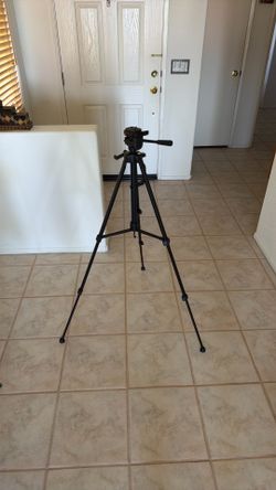 aluminum camera tripod with a 3-way pan/tilt head and quick-release plate