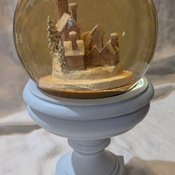 Holiday Snow Globe With Homes And White Base.