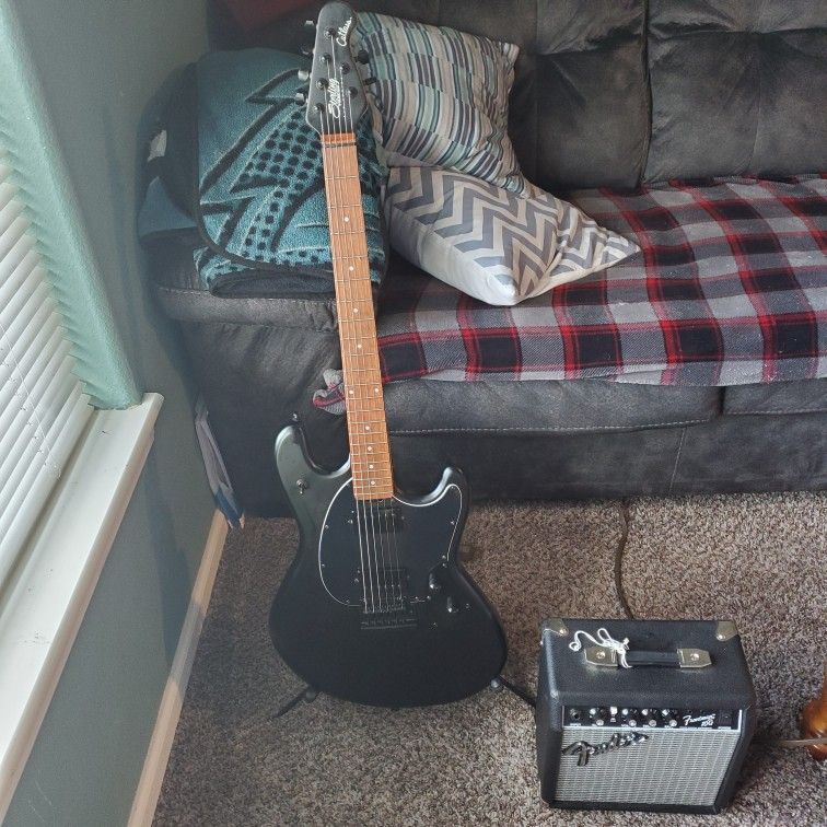 Sterling By Musicman Cutlass Stelth Guitar And Fender Amp.
