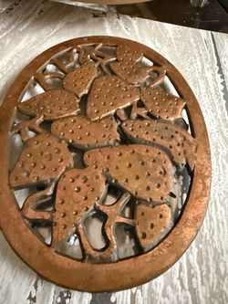 Vintage Copper Brushed Cast Iron Wall Decor~ Strawberry Trivet by Progressive International   Vintage cast iron trivet has a raised strawberry and lea