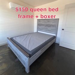 Bed frame grey wood like laminate.