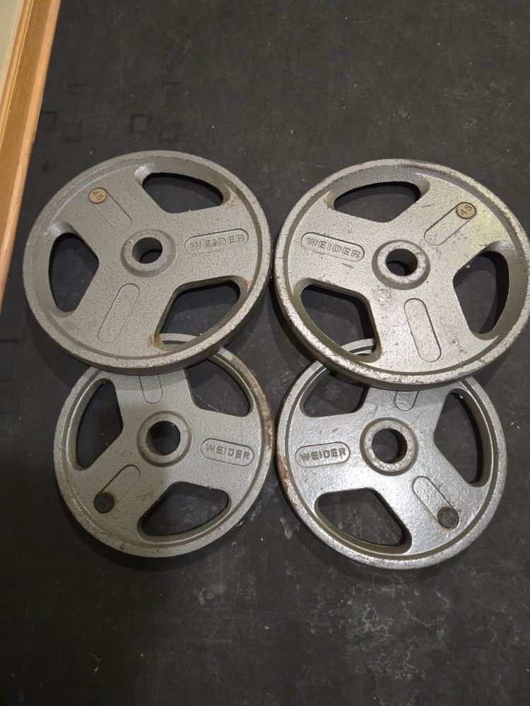 Used 35lb And 45lb Grip Plates Olympic Weight Plates--