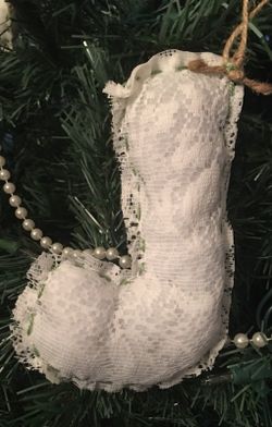 Hand sewn lace ornaments