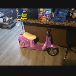 Valley Ria Girls Battery scooter. Needs a new batter. It will move a few feet on Its Own