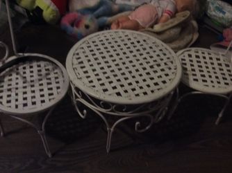 A picnic table toy picnic table made out of metal