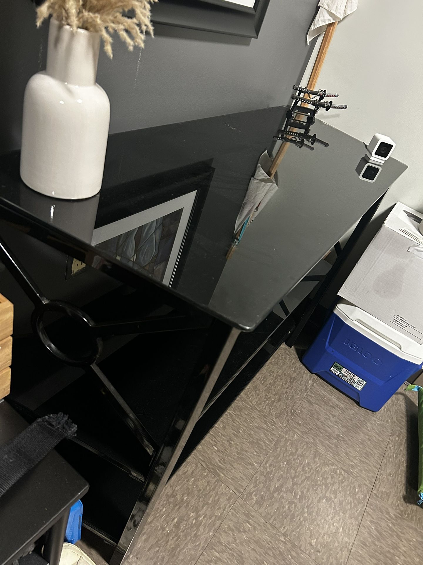 Three tier black glass table