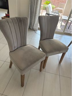 Two upholstered dining chairs (set of 2)