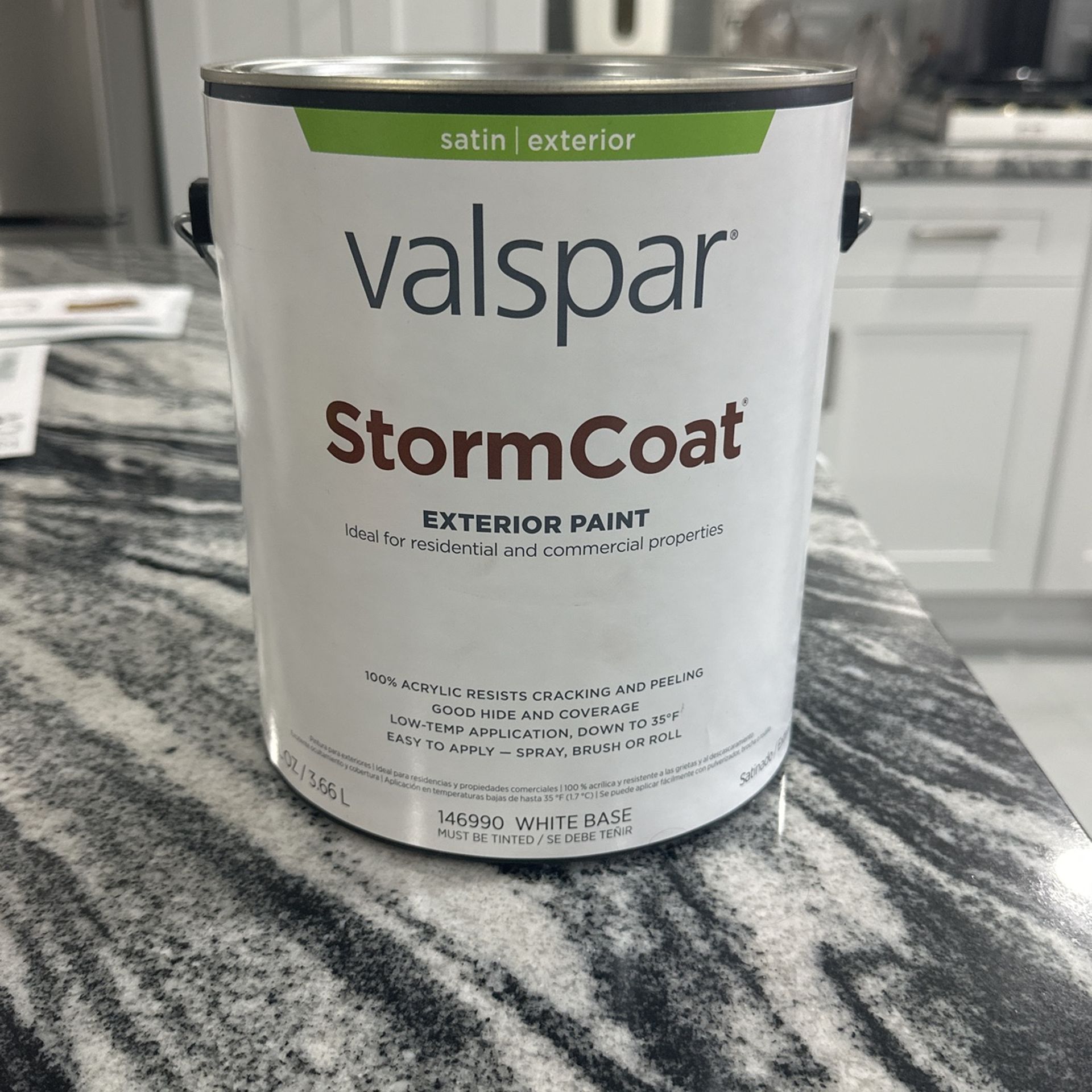 gallon of acrylic pink paint