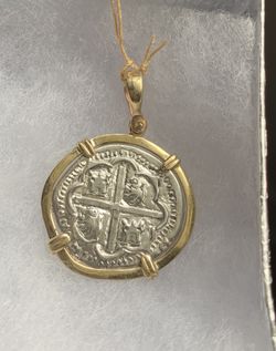 Atocha silver coin pendant in gold bezel